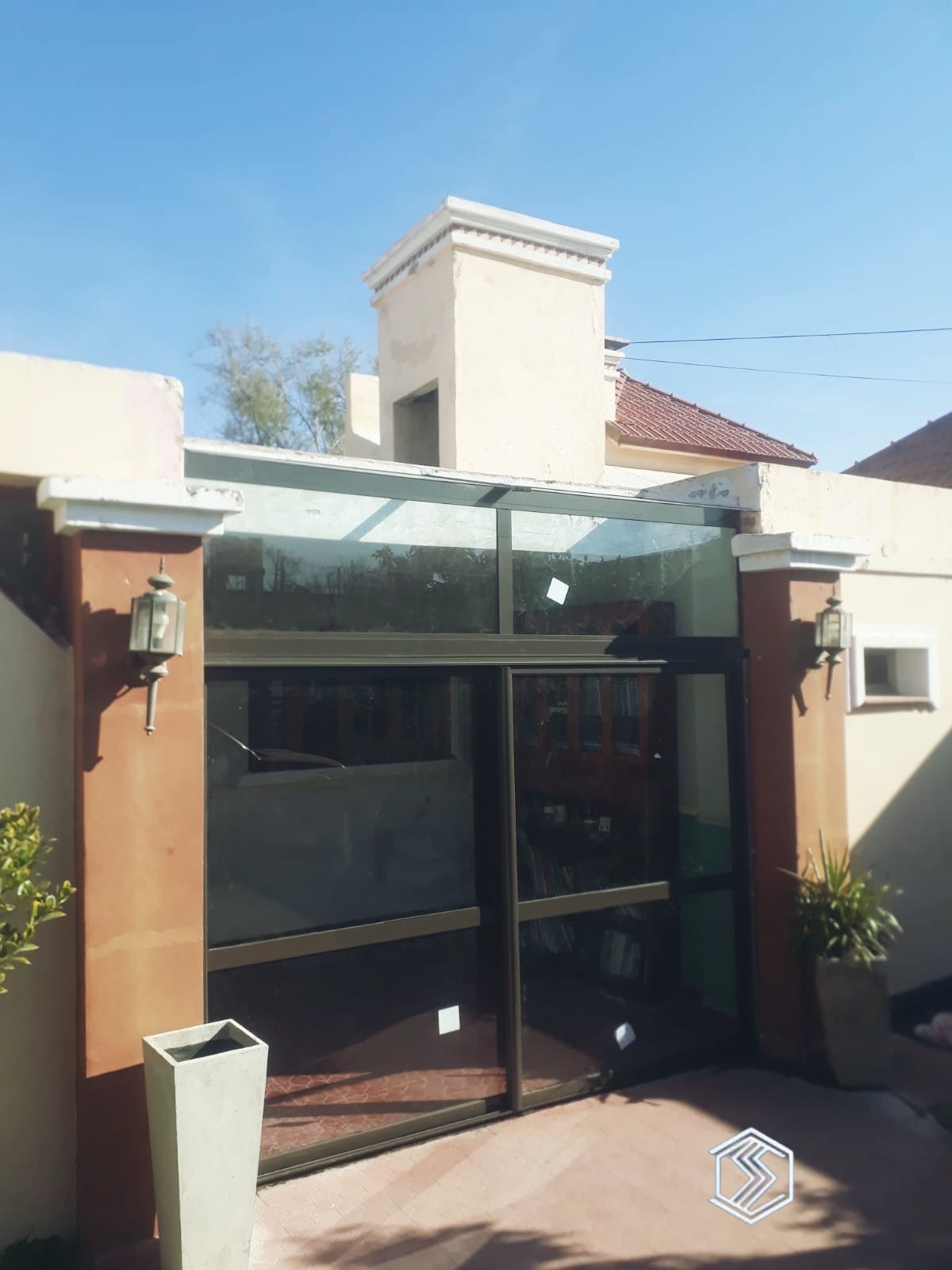 Puerta de aluminio con paño fijo